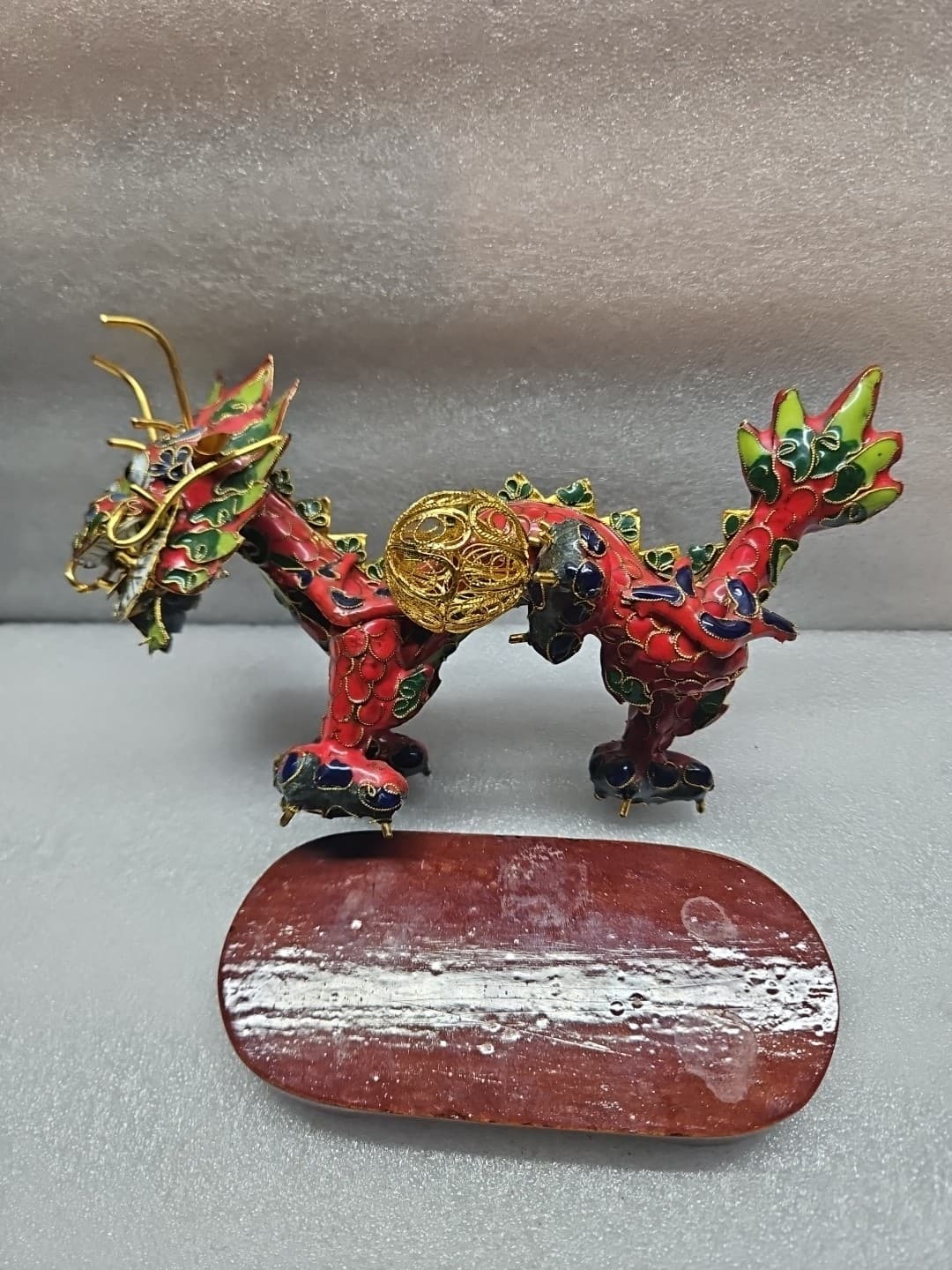 Cloisonne Chinese Dragon holding Gold Filigree Ball. Red,Gold,Green With Stand.
