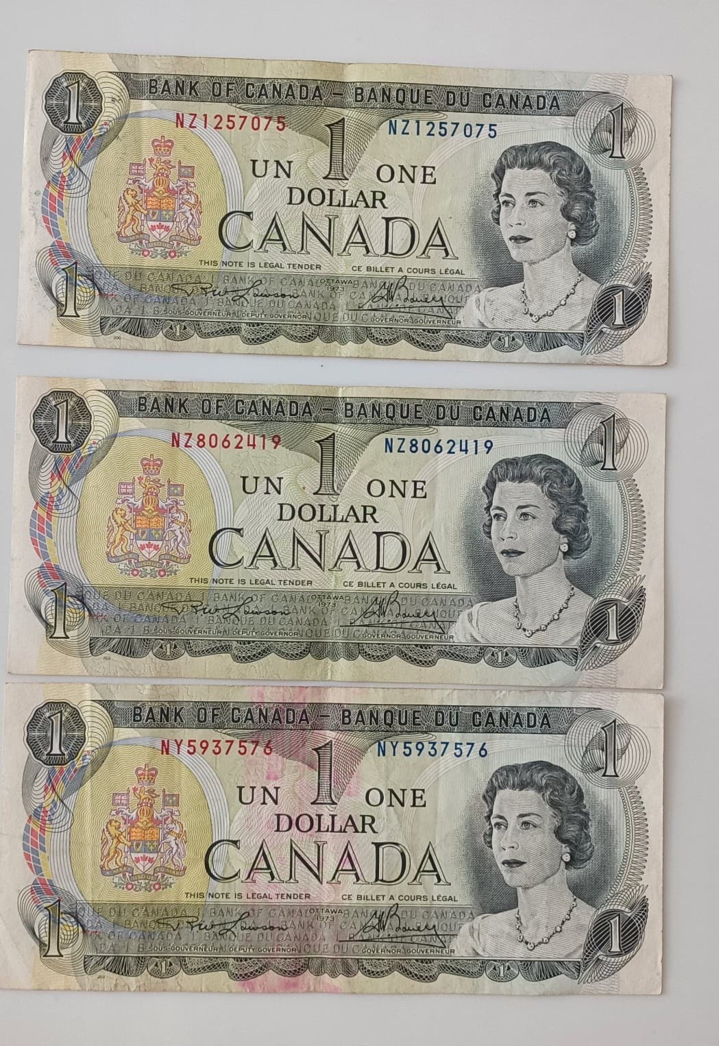 Canada 22 Lot 1973 One Dollar Bill 1968 Silver 25 Cent + 10 Cents.  1916 Cent 2