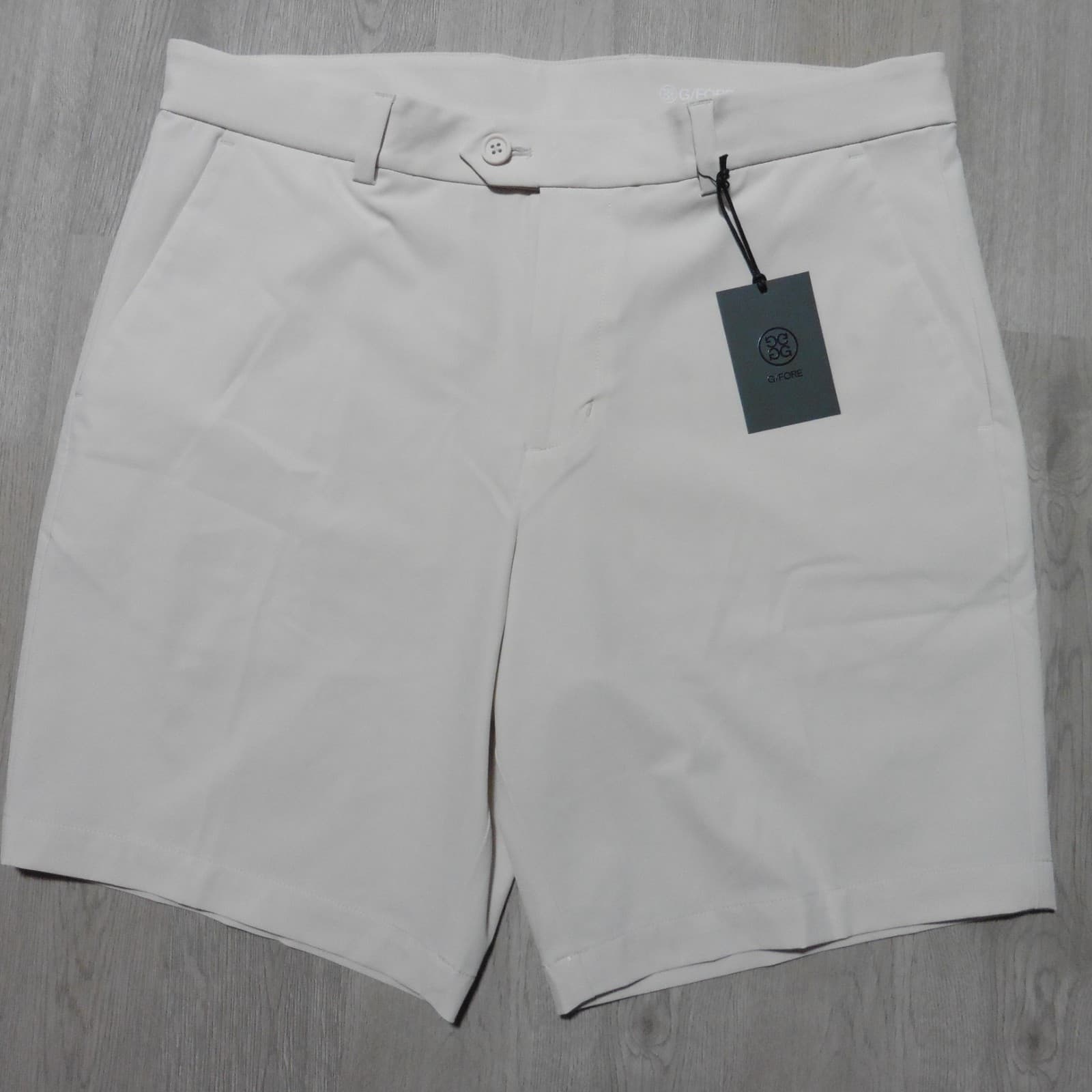 G/FORE Mens 34 SHORTS MAVERICK STONE 4-WAY STRETCH 8" PERFORMANCE GOLF GMR000019 2