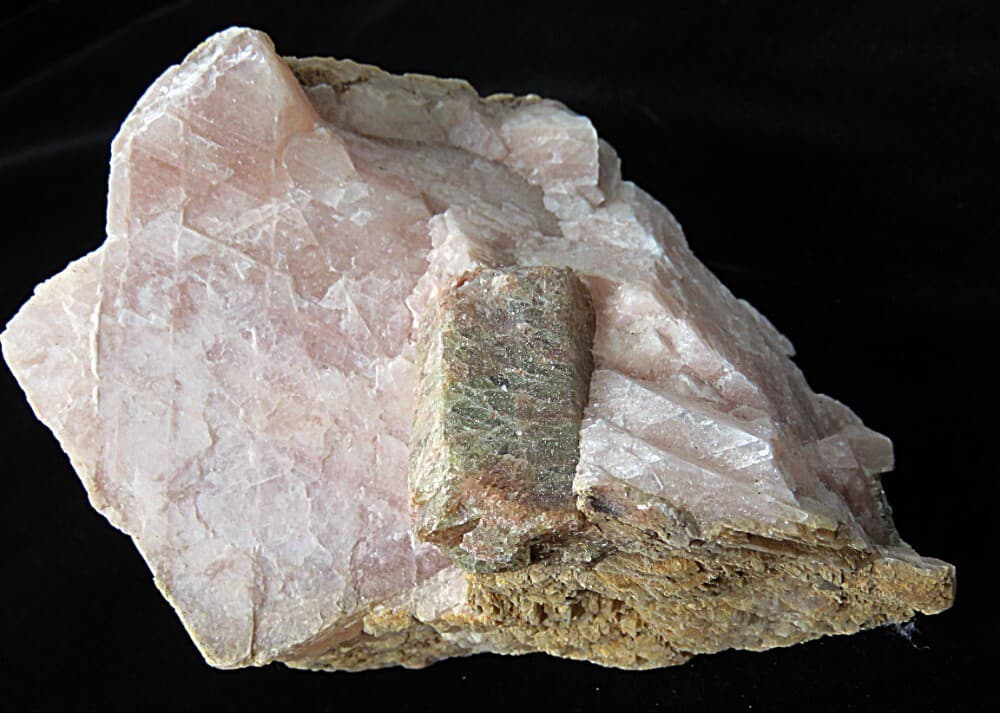 Apatite in  Fluorescent Pink Calcite- Eggansville, Canada 2