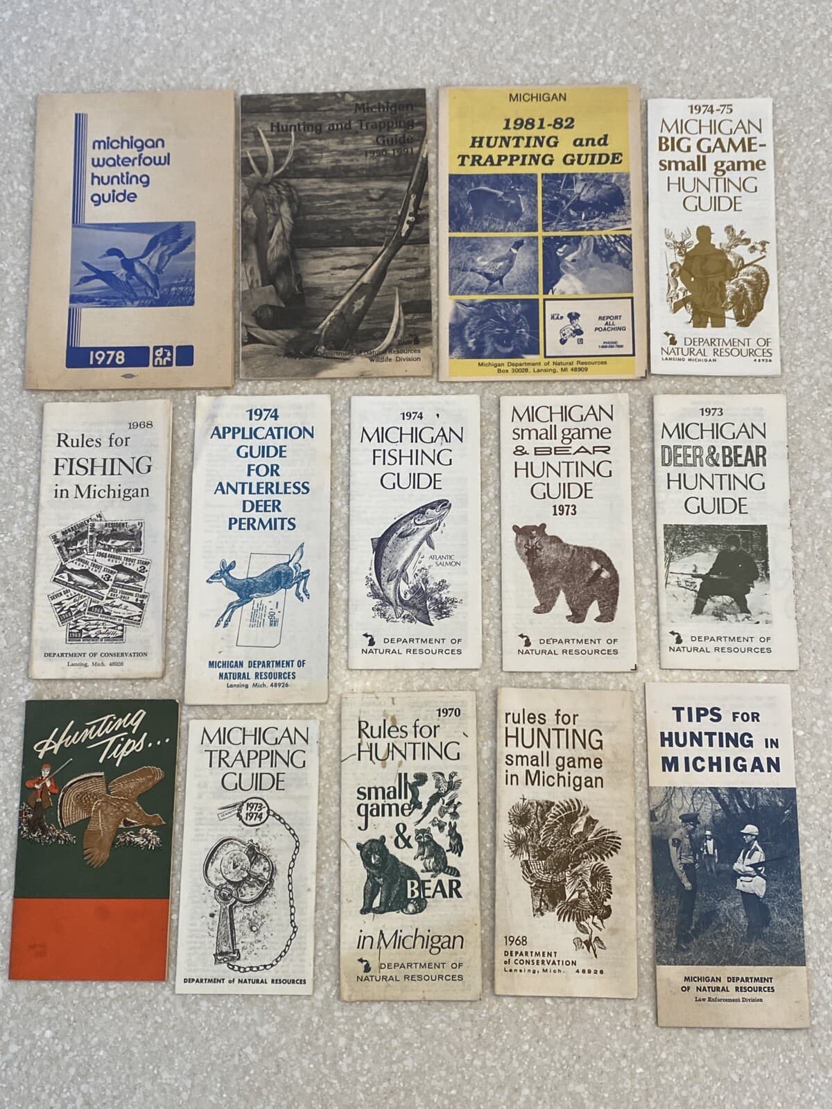 Vintage Michigan hunting fishing trapping guides, Lot of 14 Brochures, 60s-90s
