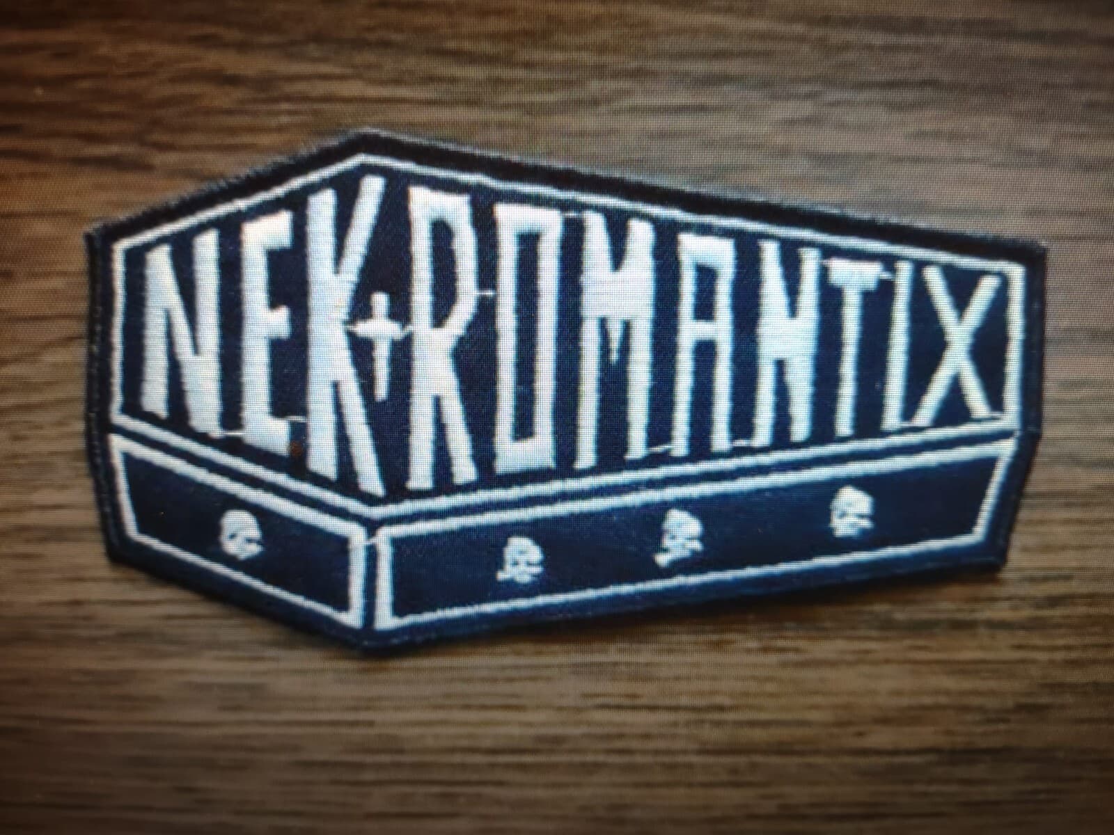 NEKROMANTIX,IRON ON WHITE EMBROIDERED PATCH