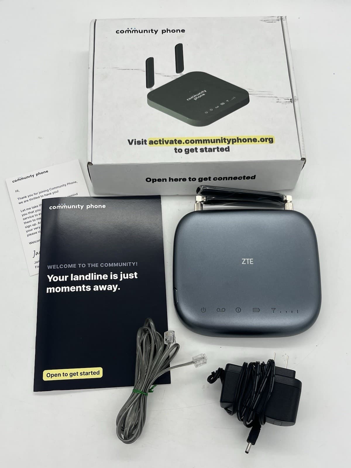 Community Phone Landline Base Antenna with AC Adapter Charger Box Manual
