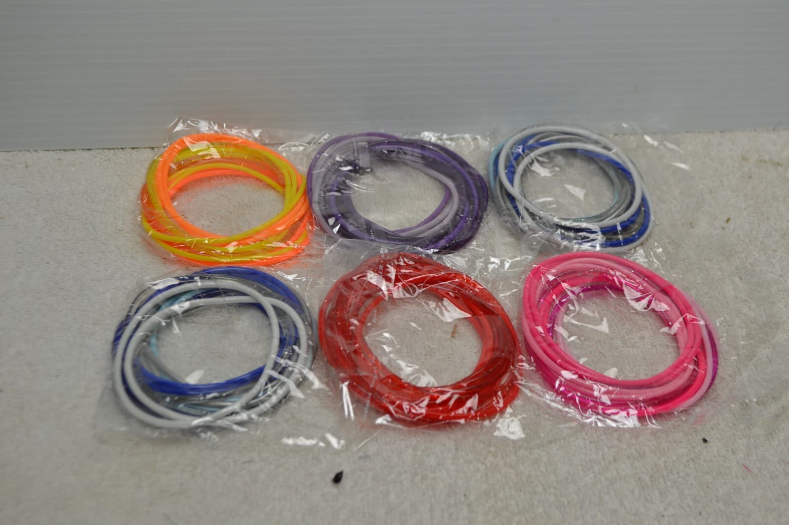 Kids friendship bracelets, lot of 6 pks, 10 each pk, variety of colors! (lot#7)