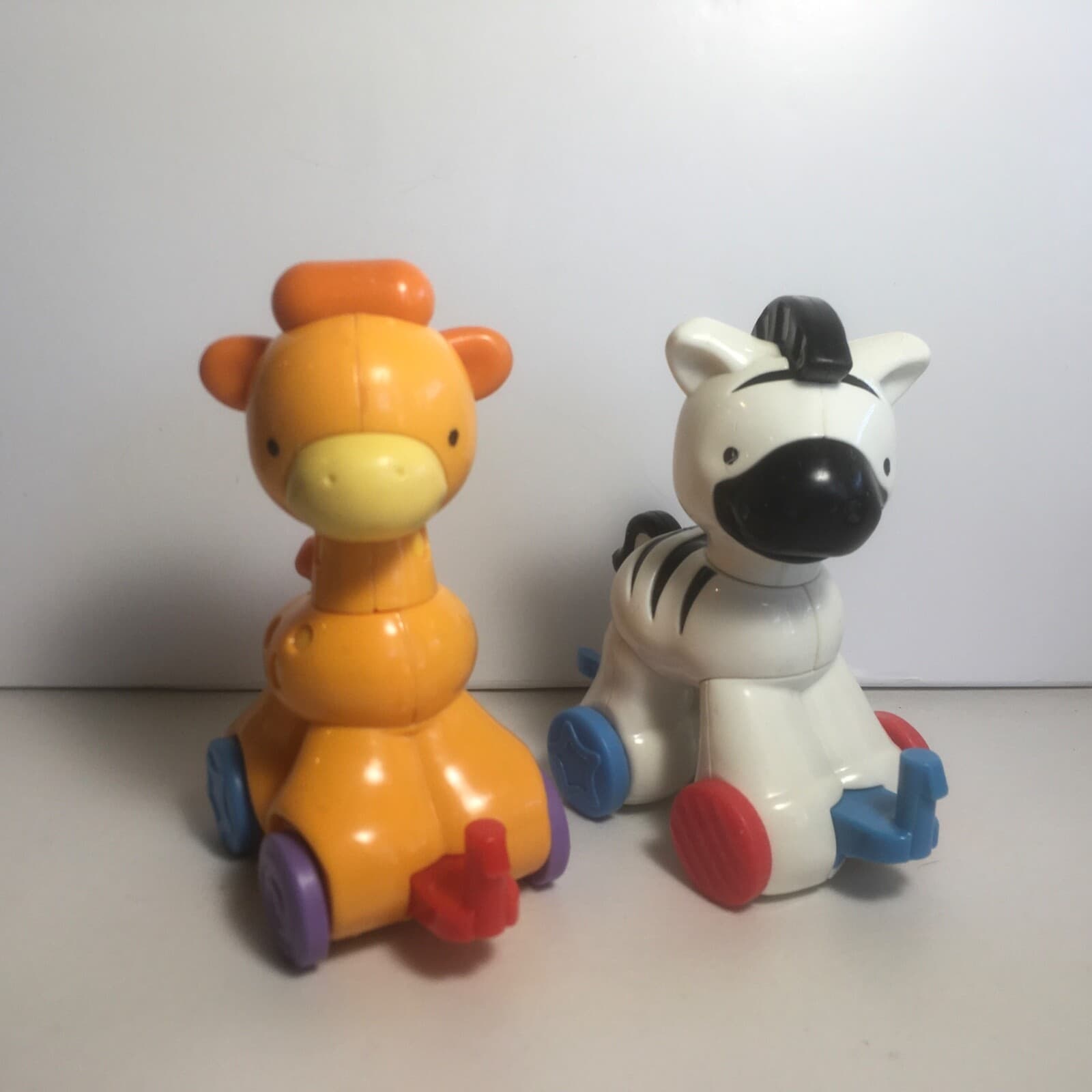 Fisher Price Amazing Animals Joint Clickers Zebra/Giraffe On Wheels