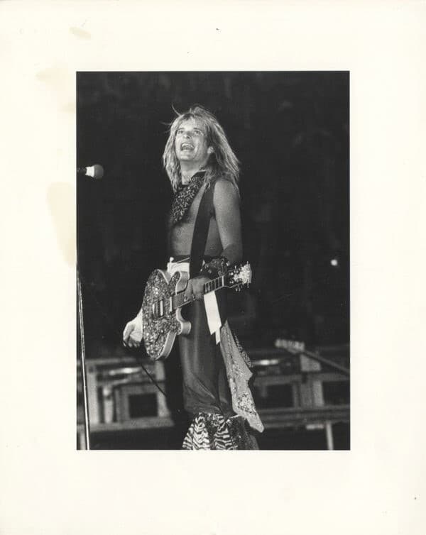 Van Halen David Lee Roth playing guitar in concert Original 8x10 Photo Stamped