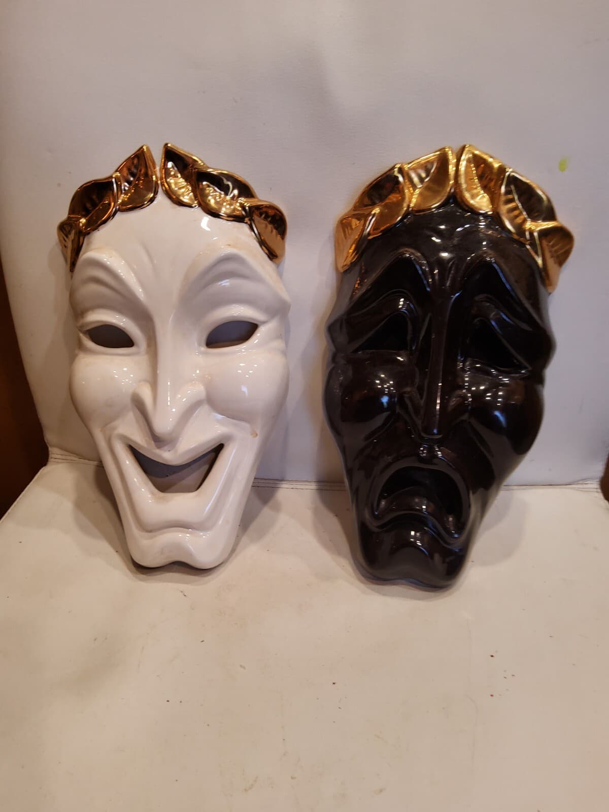 Vintage ceramic comedy and tragedy masks