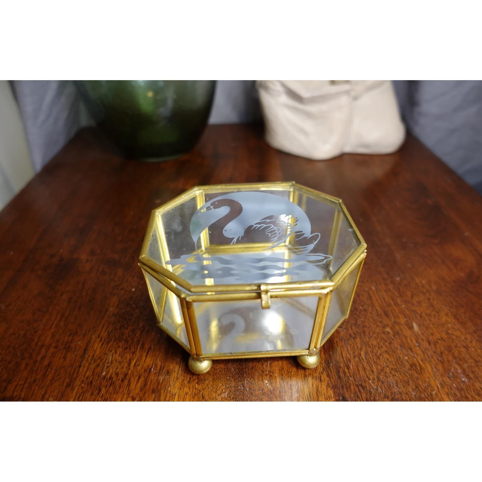 glass gold trim and hinged lid footed octagon jewelry box with mirrored base