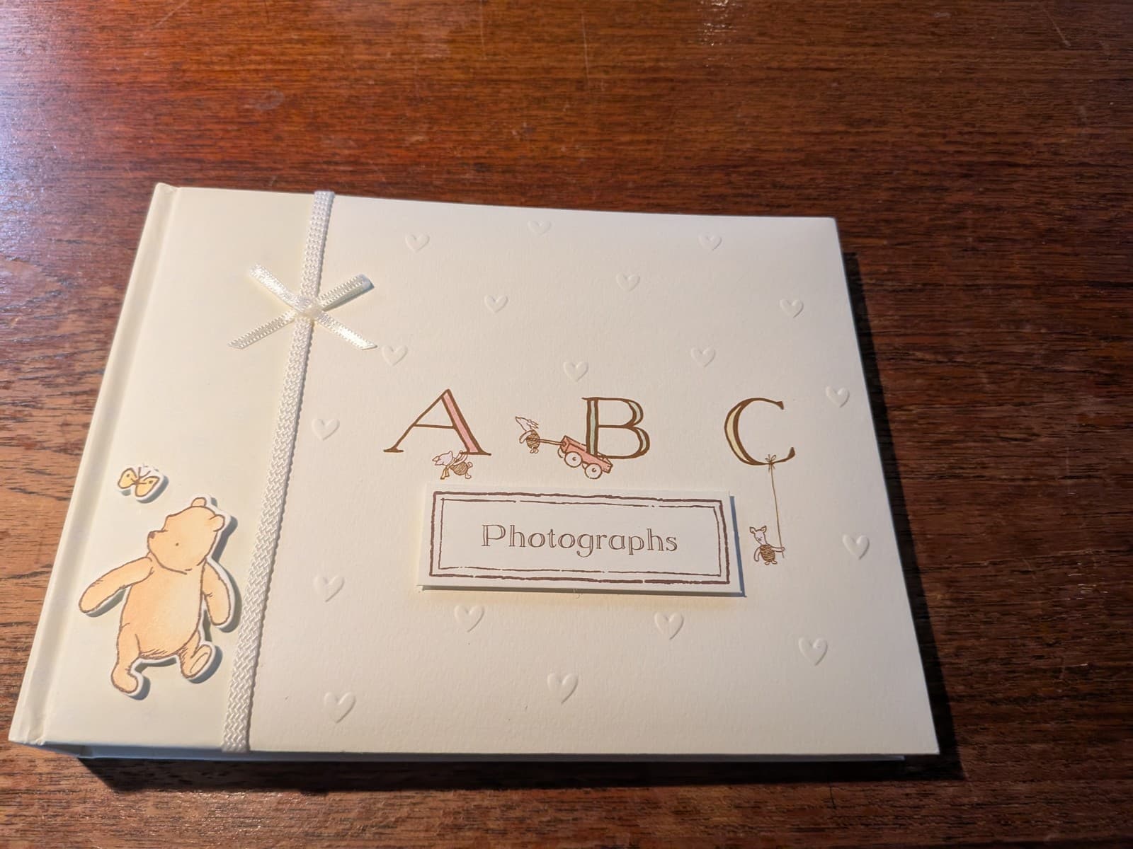 Marks and Spencer classic Pooh photo album New, ribbon box great for baby gift
