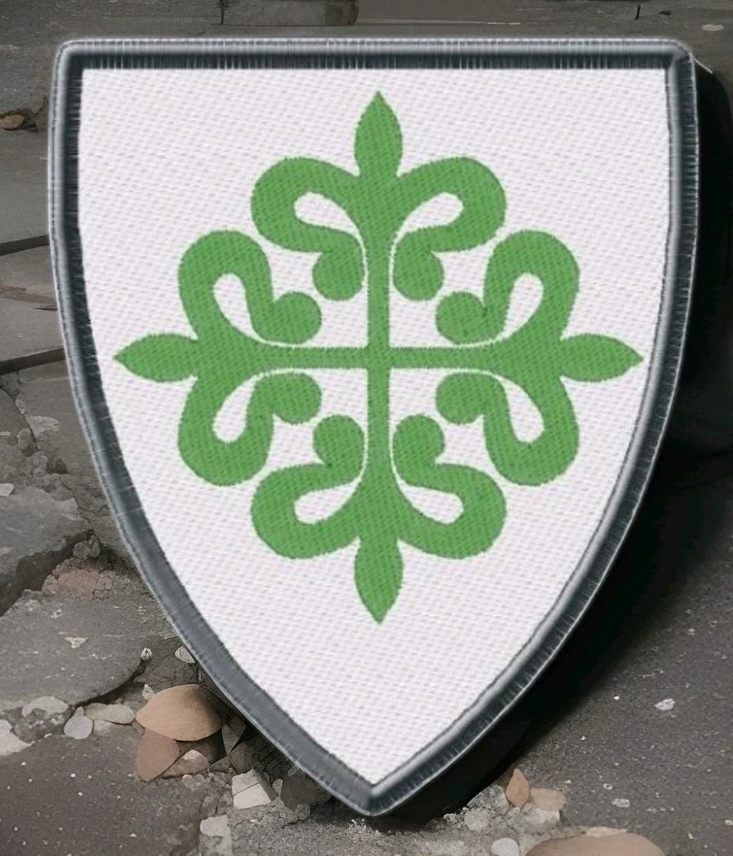 Patch with the symbols of the Order of Alcántara. Spain. 1156.