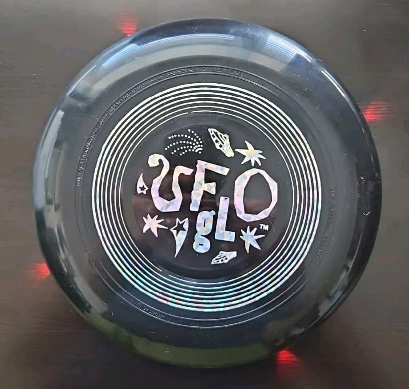 Light Up Frisbee UFO-GLO black Flying Disc 4Light-Up Works On Off Switch NEW