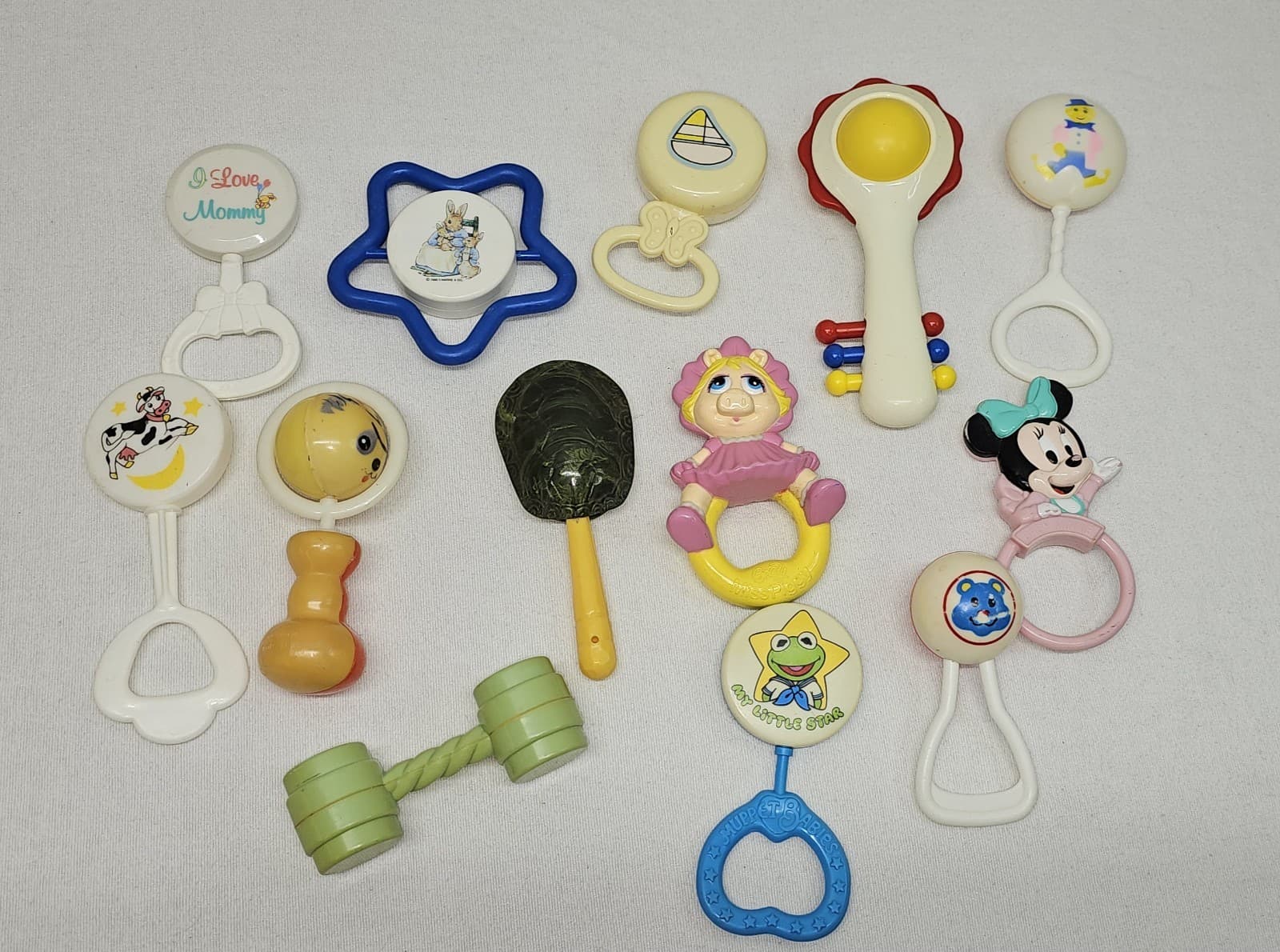 lot of vintage baby rattles Muppets peter rabbit Minnie mouse various others