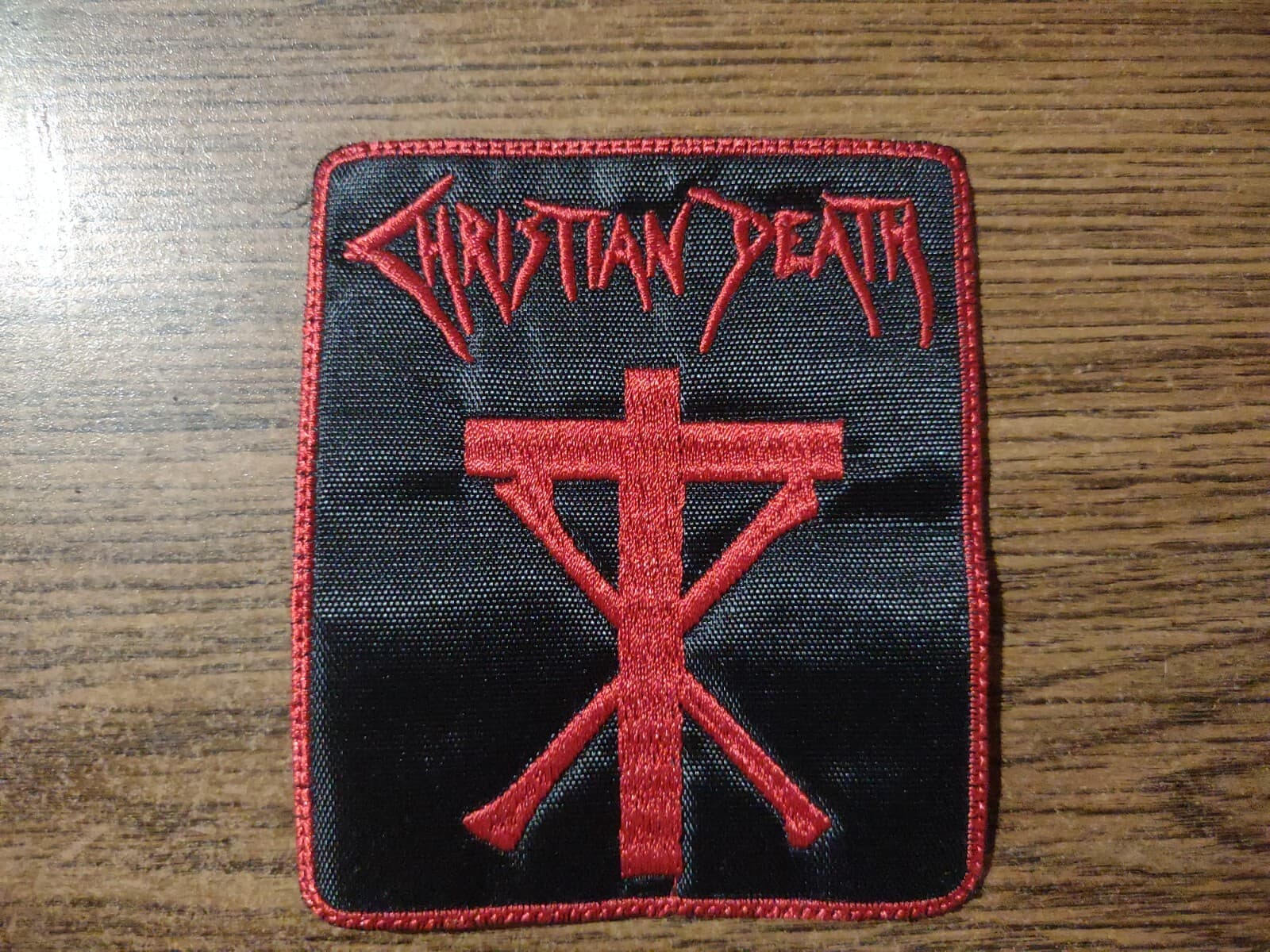 CHRISTIAN DEATH,SEW ON RED WITH RED BORDER EMBROIDERED PATCH