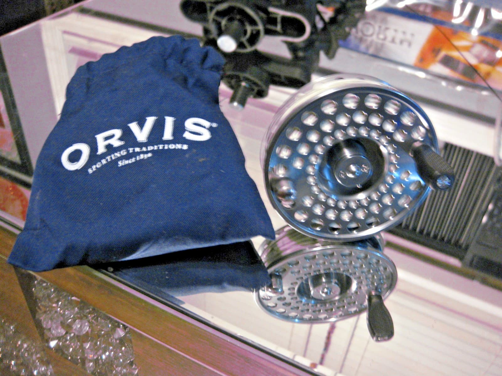 Orvis real and pouch combo. America’s premier fly-fishing outfitter since 1856.”