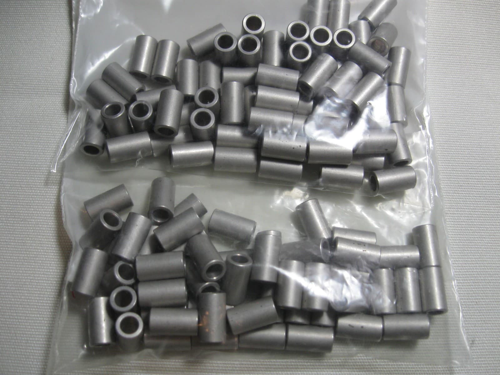 Standoff Aluminum Round 1/4" OD 0.147" ID x 7/16” long - 115 pcs - Use with 6-32