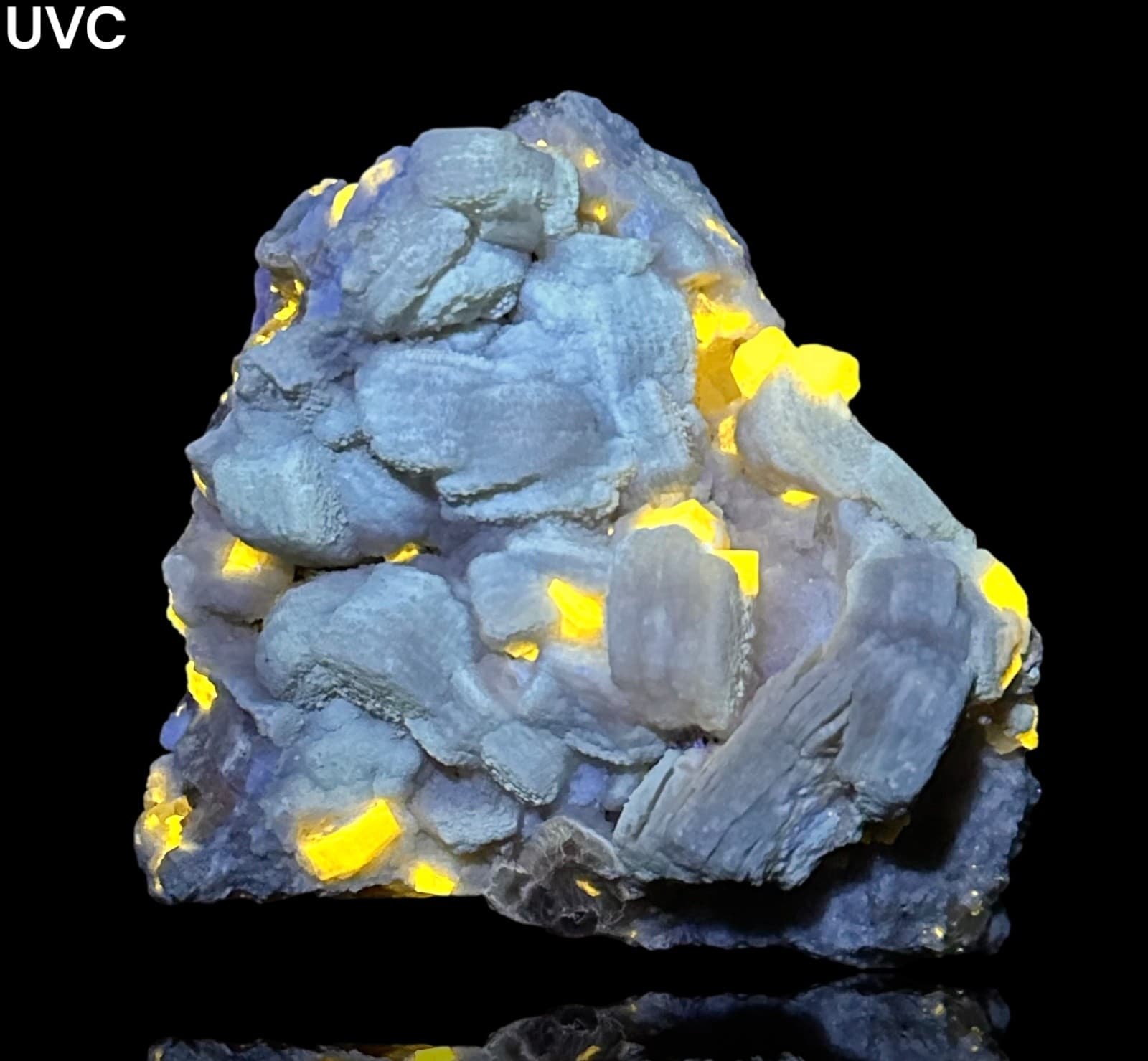 741 Gr. Fluorescent Rare Apatite Crystals Cluster With Mica Cluster On Matrix