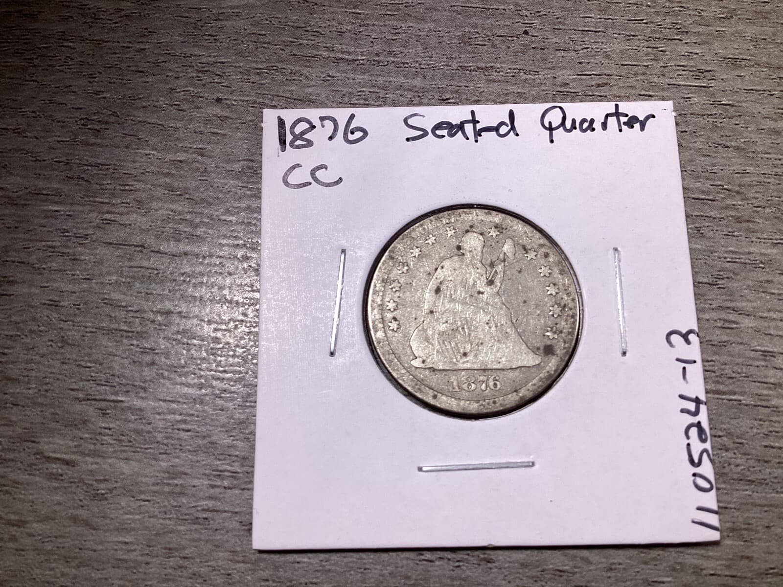 1876 CC Seated Liberty Carson City Mint CC Silver Quarter 90% Silver 110524 13ur