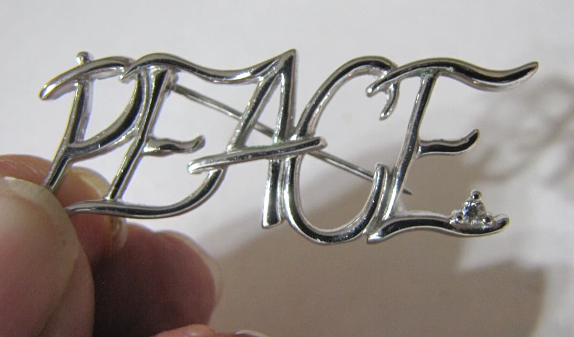 Modernist Sterling Silver Peace Cut Out Pin Open Silver Work Diamond Chip Signed