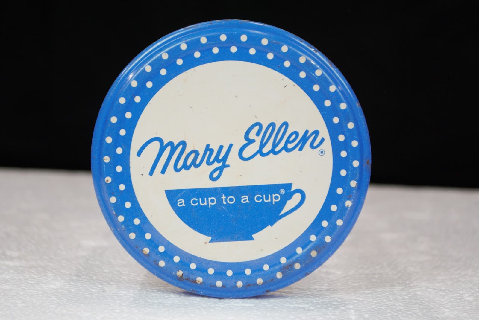 Mary Ellen a cup to a cup blue polka dot lid clear jar empty of jam and jelly