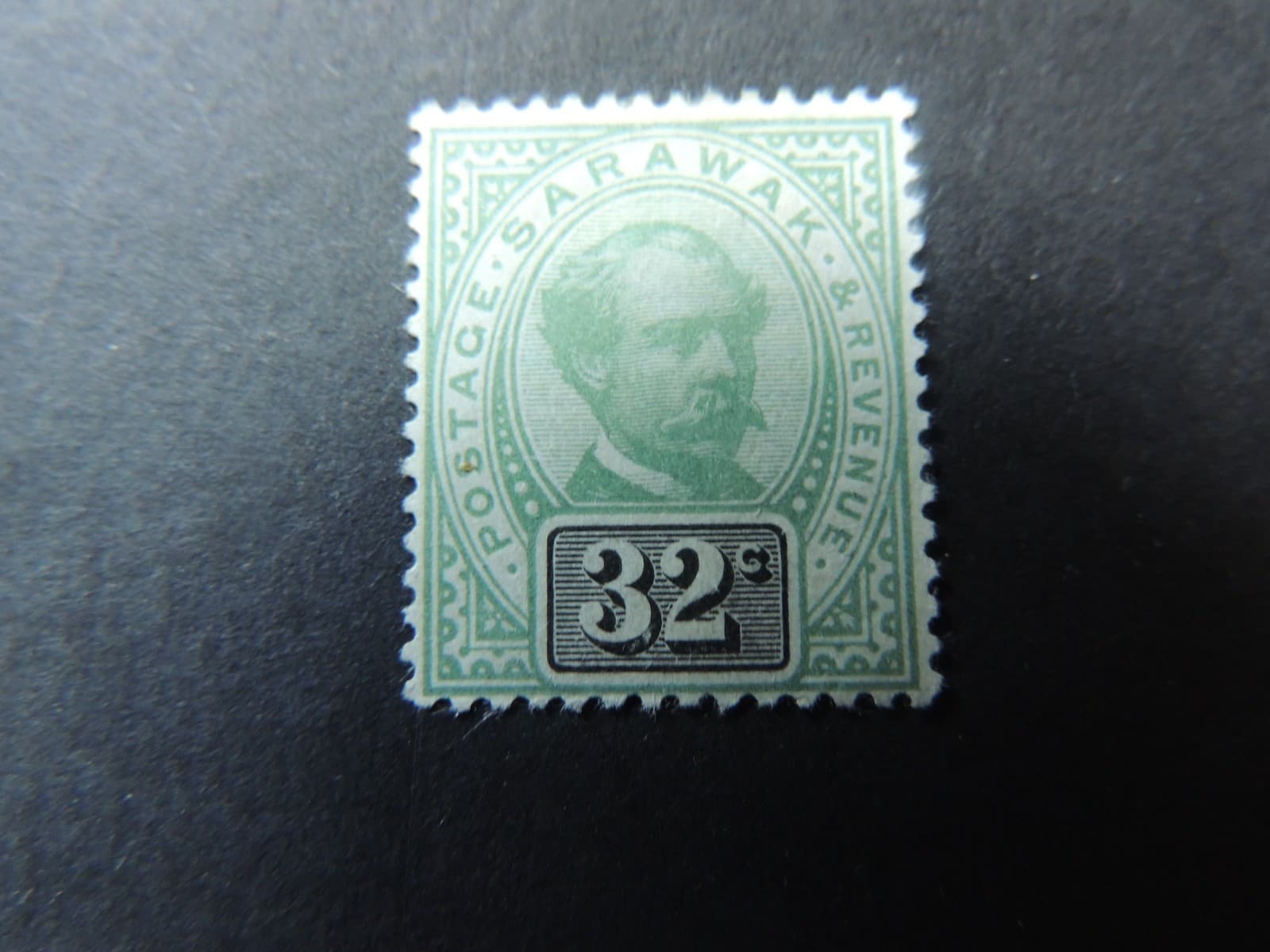 1888-97 Sarawak 32c green & black SG19 Mounted Mint