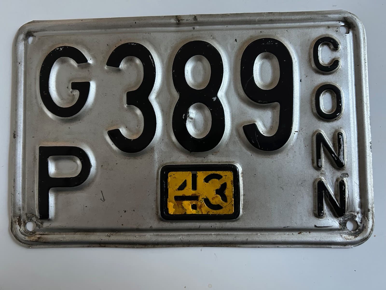 1943 Connecticut License Plate WW2 Minor touch up Metal Year Tab on undated base
