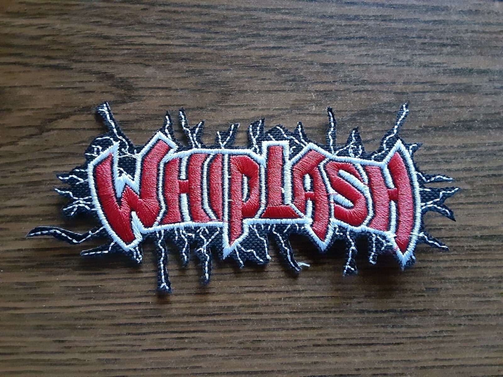 WHIPLASH,IRON ON RED AND WHITE EMBROIDERED PATCH