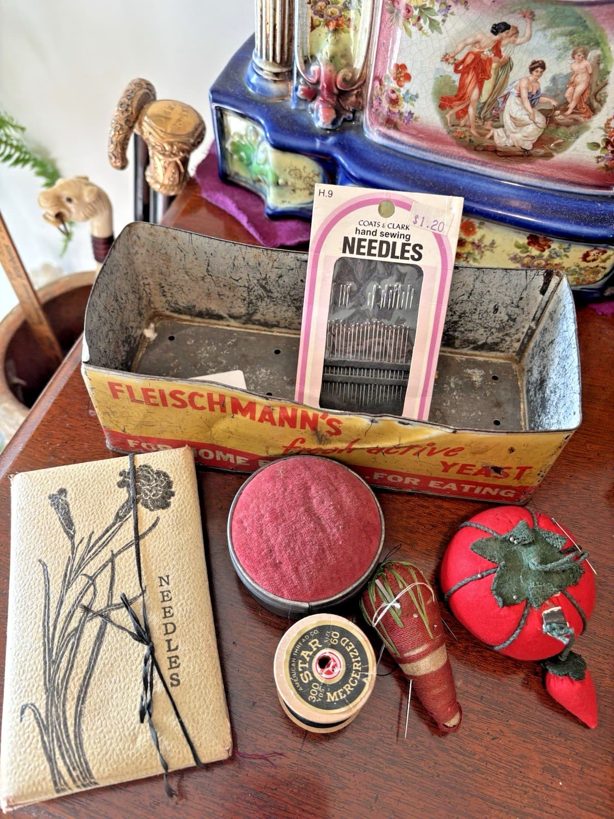 ANT TIN YEAST CONTAINER + 6 NOITIONS: ANTIQUE PIN CUSHIONS, FOLD OUT NEEDLE PACK