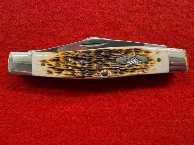 UNCOMMON CASE XX 6375 CV LARGE STOCKMAN, SCRIMSHAWED SCALE (428)