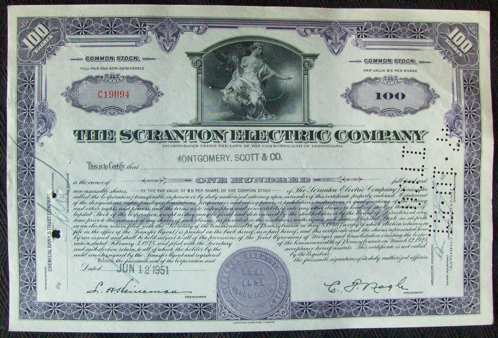 Stock certificate Scranton Electric Comp. Payee Montgomery, Scott & Co 1951.