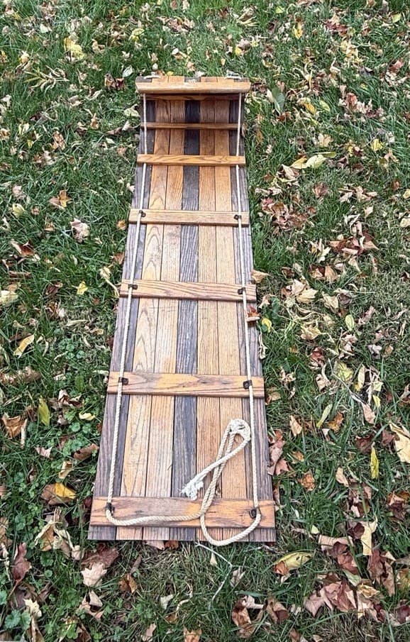 vintage wooden toboggan sled