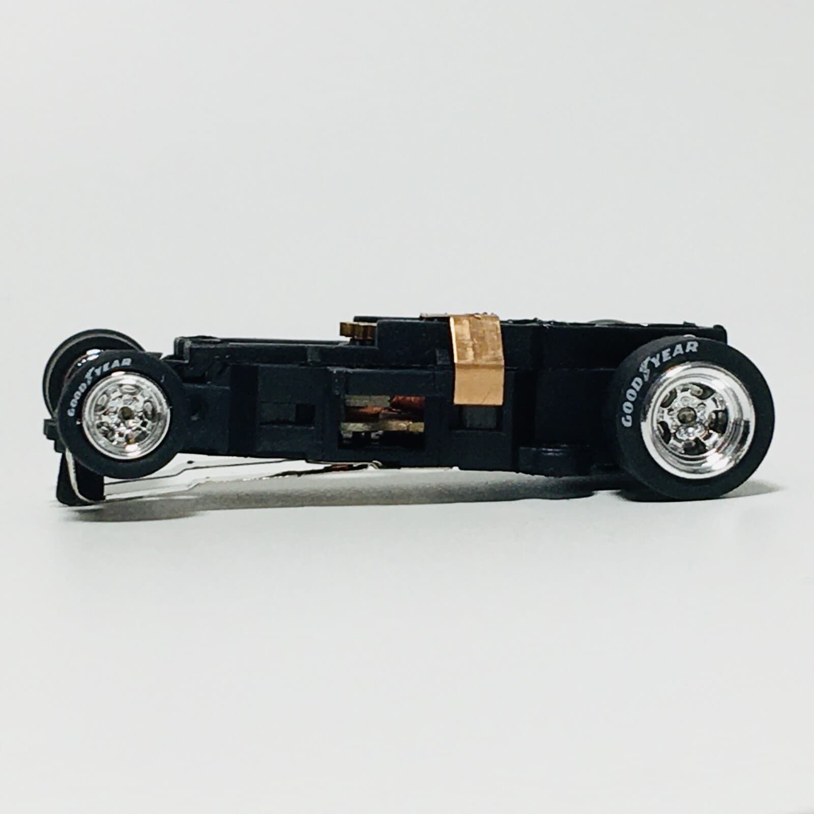 Auto World 4 Gear Chassis, Chrome Wheels, Good Year Tires, Brand New