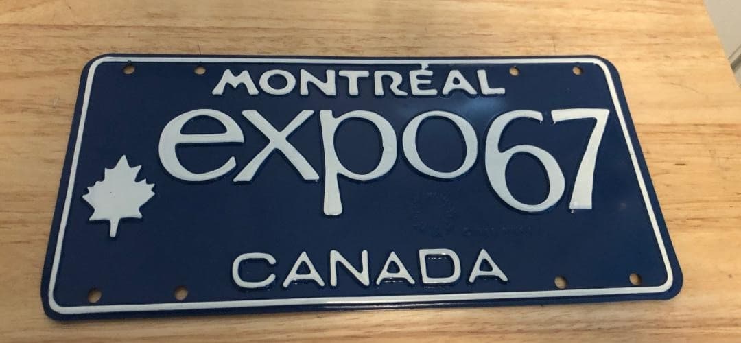 “MONTRÉAL EXPO 67” Blue Metal License Plate World’s Fair Canada 1967 Unused READ