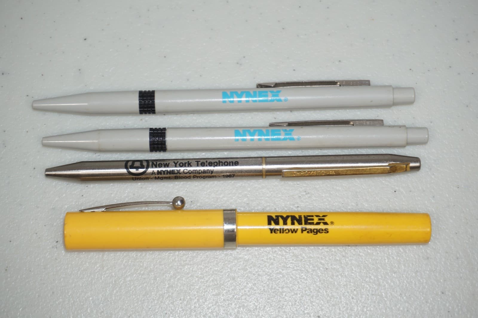 Lot of 4 NYNEX NY Telephone Co. Ballpoint Pens Vintage 1980's (no ink)