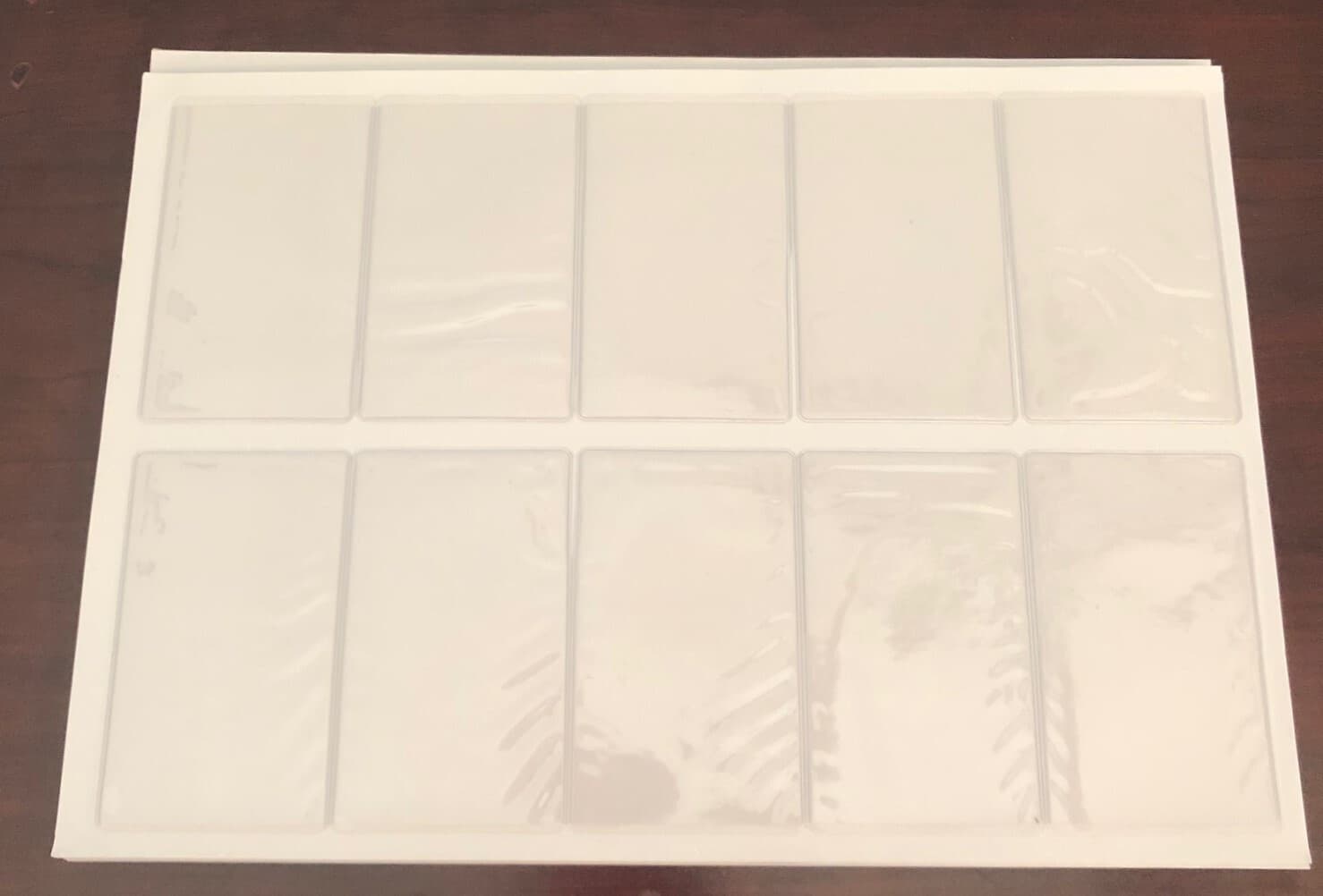 2 1/4" x 3 3/4" Clear Flexible Vinyl Pouch w/Adhesive Backing - Pack of 100